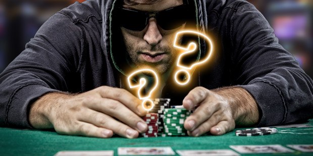 poker player with question marks over his chips